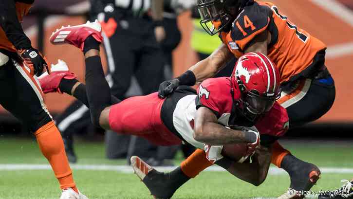 Stampeders clinch playoff spot, eliminate Lions with 33-23 win over B.C.