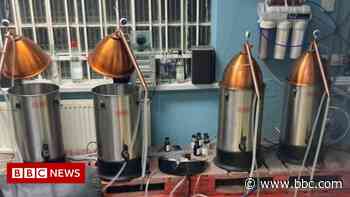 Raid on illegal Bolton alcohol distillery finds 350,000 pints of beer - BBC News
