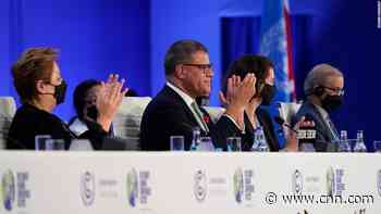 Nations reach climate deal with unprecedented reference to fossil fuels, but doesn't reflect urgency of crisis