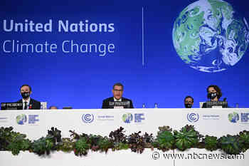 Nearly 200 nations strike contentious climate deal with coal compromise