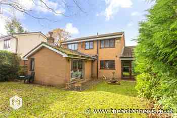 Jacuzzi, spa bath and sauna and high ceilings are great mixing old with new in this superb family home in Bolton