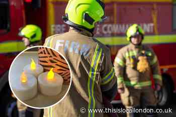 Woman rescued from house fire in Morden