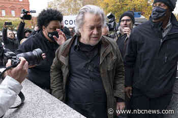 Former Trump adviser Steve Bannon surrenders on contempt of Congress charges