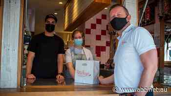 'An emotional day': Burger store reopens following Melbourne earthquake damage