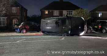 Car overturns after crashing into parked vehicles on Yarborough Road, Grimsby - Grimsby Live