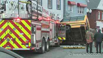 Report: 2 hurt in crash between school bus, fire truck in Buffalo
