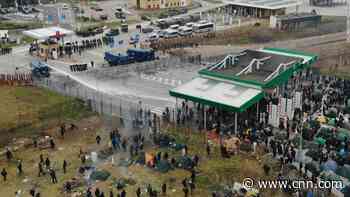 'We are fighting to stay alive': Migrants throw rocks at guards