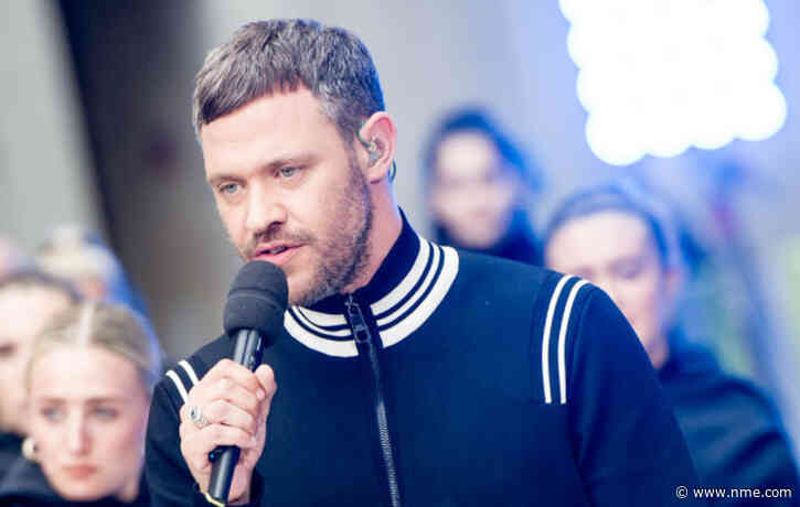 Will Young handcuffs himself to gates of dog-breeding centre