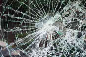 Man in court after damaging window - The Bolton News
