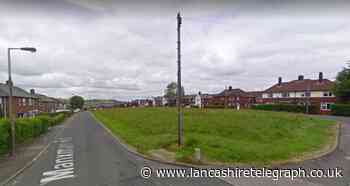 Blackburn: masked men with weapons barge into house