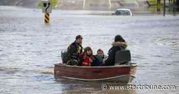US-Canada border towns assess damage from devastating floods