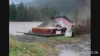 'The river just took it under': B.C. family can only watch as flood sweeps away home