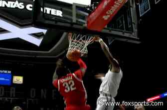 Paul Scruggs gets to the hoop for the slam to help Xaiver extend lead against Ohio St