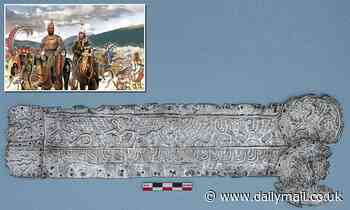 Ancient plate adorned with winged gods and griffins found in tomb of 4th century BC warrior