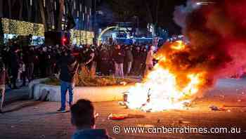 Shots fired at Dutch coronavirus riot - The Canberra Times