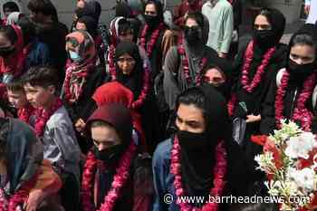 Female footballers fleeing Afghanistan fly in to the UK - Barrhead News