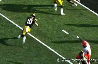 Arland Bruce IV pushes through defender for 2-yard touchdown to score for Iowa