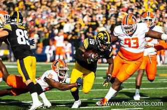 Tyler Goodson rushes for 127 yards as Iowa holds off Illinois upset scare, 33-23
