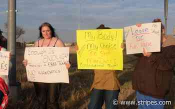 Demonstrators gather outside veterans medical center to protest vaccine mandates - Stars and Stripes
