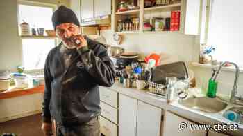 Residents in Princeton, B.C., sort through ruined belongings in flood-ravaged homes