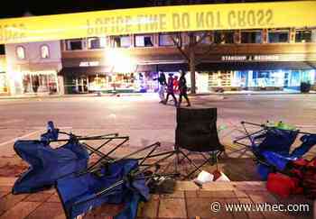 SUV driver ID'd in parade crash; was he fleeing a crime?