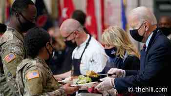 Biden, first lady have 'Friendsgiving' meal with military troops