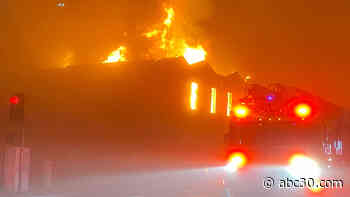 Firefighters battle large fire at commercial building in downtown Fresno