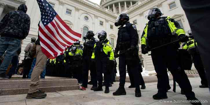 A man who was accused of discharging bear spray at law enforcement officers during the Capitol riot was arrested by the FBI after he enlisted in the Air Force