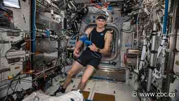 Want to solve the world's problems? Think big, says Canadian astronaut