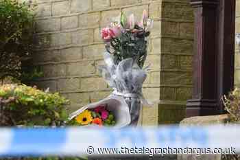 Floral tributes left at scene where Bradford woman found dead