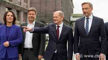 Olaf Scholz in line to succeed Angela Merkel as chancellor as German parties strike deal