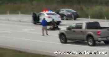 Watch: Good Samaritan with Firearm Saves Cop Pinned by Suspect