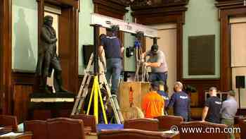 A statue of Thomas Jefferson is removed from New York City Hall after 187 years