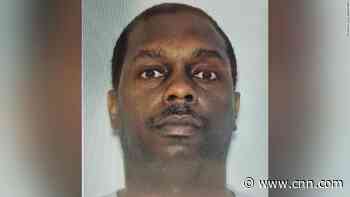 Man who fled Atlanta airport after weapon discharged still at large