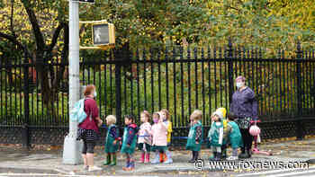 NYC school kids eat lunch outside despite dropping temps in order to social distance