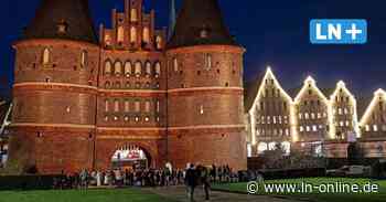 Lübeck leuchtet orange: Symbolische Aktion gegen Gewalt an Frauen