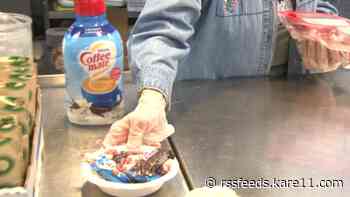 Volunteers serve Thanksgiving breakfast to those in need