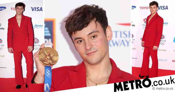 Tom Daley ditches knitwear for high fashion as he attends Team GB ball ...