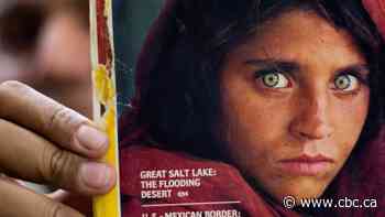 Afghan woman featured on iconic National Geographic cover arrives in Italy