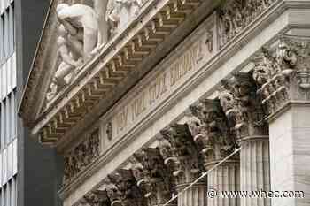 Stocks sink on new COVID variant; Dow loses 905 points