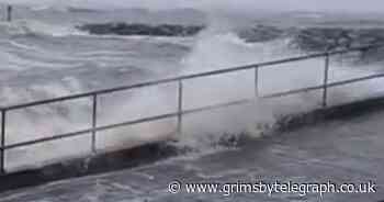 Storm Arwen sends waves crashing over barrier in Cleethorpes - Grimsby Live