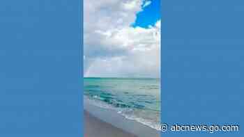 WATCH:  Rainbow appears over Miami-area beach