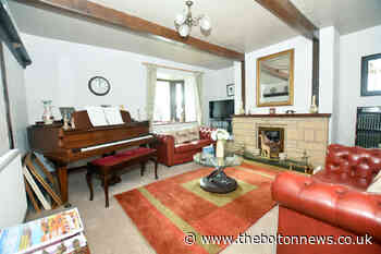 Two cottages merged to become charming and character-filled Little Lever home