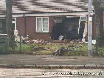Man arrested after crashing into a property, injuring a 92-year-old woman