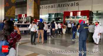 Coronavirus live updates: Union health ministry revises rules for international arrivals - Times of India