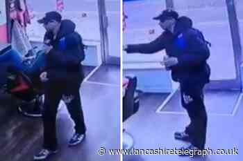 Police release CCTV image following alleged racist incident at barbers