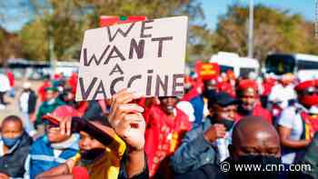 Scientists at odds about what made Omicron variant more likely