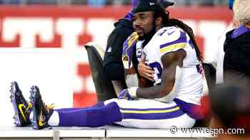 Vikings RB Cook carted off with shoulder injury