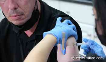 Coronavirus: Moderna could deploy omicron variant vaccine next year, report says - silive.com