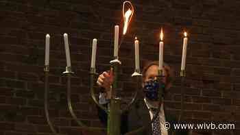 Chabad House of Buffalo lights giant community menorah to mark the start of Hanukkah
